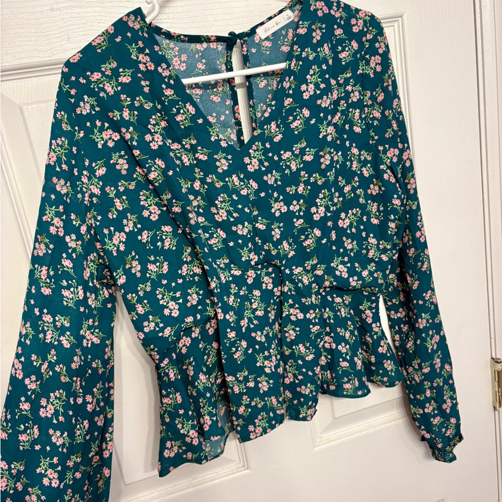 Green top with pink floral pattern
